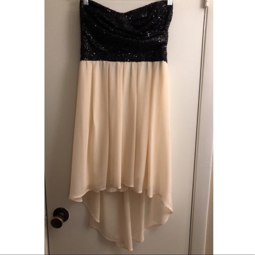 Beautiful black and cream dress with sequin top.